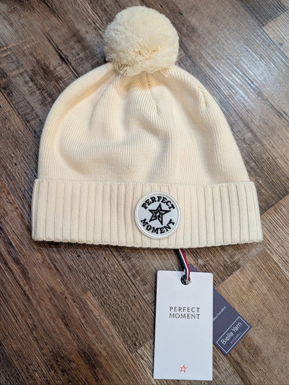 NWT Perfect Moment 100% Merino Wool Logo Patch II Pom Pom Beanie Snow White